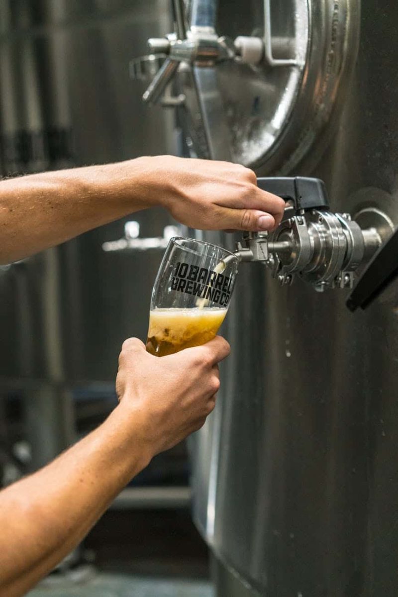 Taproom pour at a brewery, beer brand experience at point of consumption